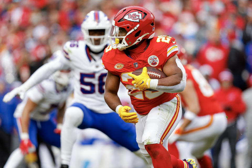 KANSAS CITY, MISSOURI - DECEMBER 10: Clyde Edwards-Helaire #25 of the Kansas City Chiefs carries the ball during the first half of the game against the Buffalo Bills at GEHA Field at Arrowhead Stadium on December 10, 2023 in Kansas City, Missouri. (Photo by David Eulitt/Getty Images)