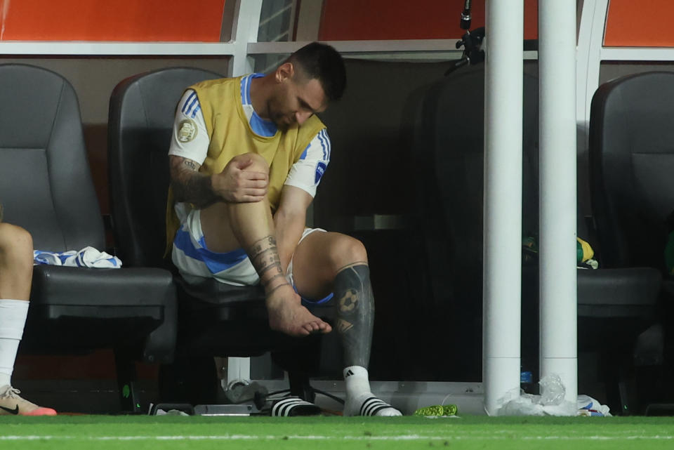 MIAMI GARDENS, FL - JULY 14: Argentina forward Lionel Messi (10) checks his ankle after injuring it in the second half during the Copa America Finals match between Colombia and Argentina on Sunday, July 14 2024 at Hard Rock Stadium in Miami Gardens, Fla. (Photo by Peter Joneleit/Icon Sportswire via Getty Images)