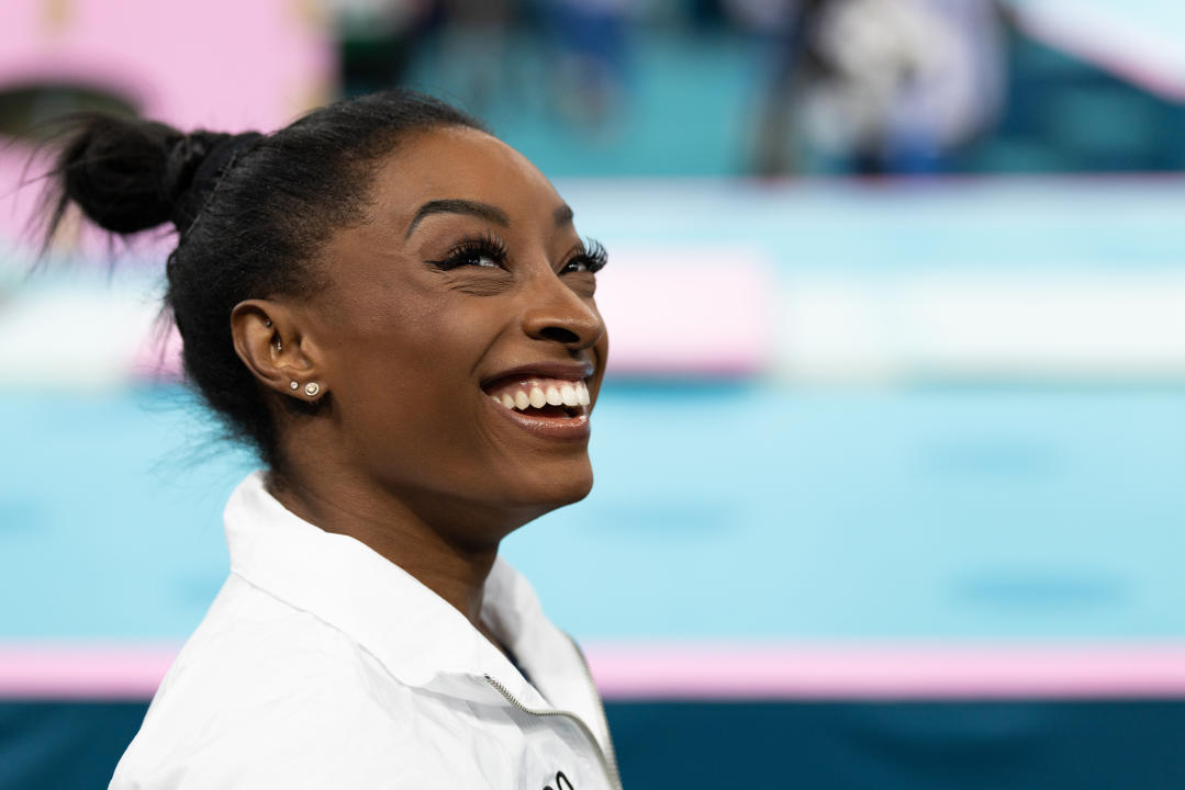 PARIS, FRANCE - JULY 30: Simone Biles of United States smiles during the Artistic Gymnastics Women's Team Final on day four of the Olympic Games Paris 2024 at Bercy Arena in Paris, France on July 30, 2024. (Photo by Aytac Unal/Anadolu via Getty Images)