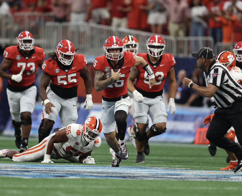 ATLANTA, GEORGIA - AUGUST 31: Quarterback Carson Beck #15 of the Georgia Bulldogs runs during the Aflac Kickoff Game against the Clemson Tigers at Mercedes Benz Stadium on August 31, 2024 in Atlanta, Georgia. (Photo by Mike Zarrilli/Getty Images)