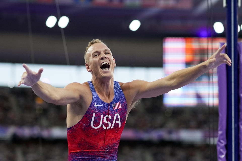 Sam Kendricks, of the United States, reacts during the men's pole vault final at the 2024 Summer Olympics, Monday, Aug. 5, 2024, in Saint-Denis, France. (AP Photo/Bernat Armangue)