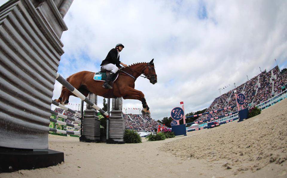 Paris 2024 Olympics - Modern Pentathlon - Men's SF A Riding Show Jumping - Chateau de Versailles, Versailles, France - August 09, 2024. Georgiy Boroda-Dudochkin of Kazakhstan riding Falco d'Espoir in action. REUTERS/Zohra Bensemra