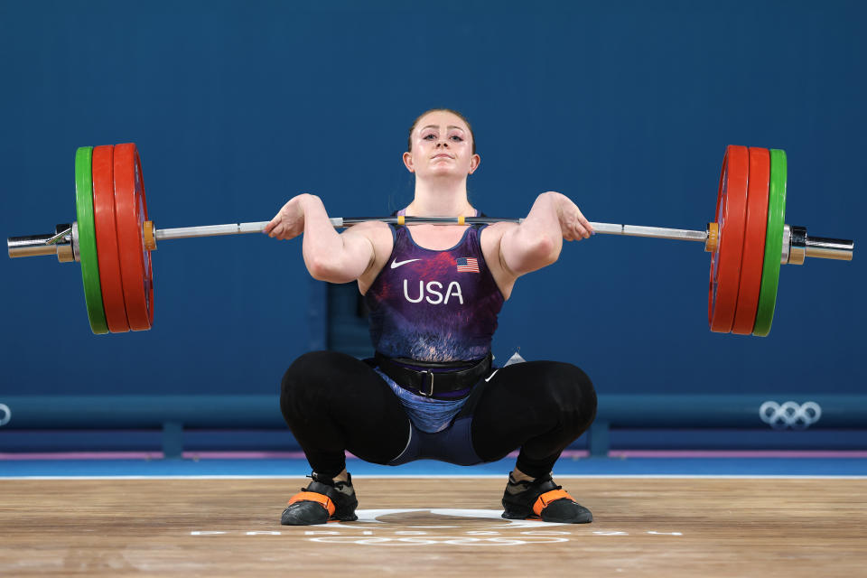 PARIS, FRANCE - AUGUST 09: Olivia Reeves of Team United States performs a clean and jerk during the Weightlifting Women's 71kg on day fourteen of the Olympic Games Paris 2024 at South Paris Arena on August 09, 2024 in Paris, France. (Photo by Lars Baron/Getty Images)