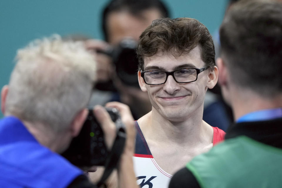 Stephen Nedoroscik, of the United States, smiles after competing in the men's artistic gymnastics individual pommel finals at Bercy Arena at the 2024 Summer Olympics, Saturday, Aug. 3, 2024, in Paris, France. (AP Photo/Charlie Riedel)