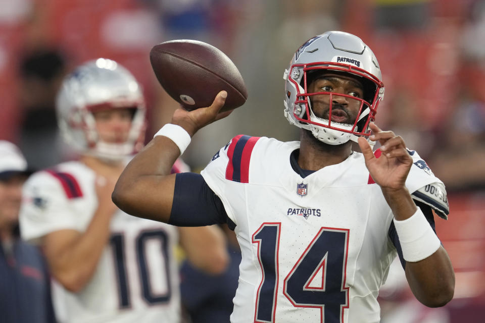 New England Patriots quarterbacks Jacoby Brissett (14) will start the season at quarterback ahead of Drake Maye (10). (AP Photo/George Walker IV)