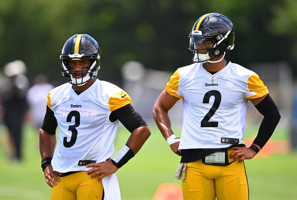 PITTSBURGH, PENNSYLVANIA - JUNE 6: Russell Wilson #3 looks on alongside Justin Fields #2 of the Pittsburgh Steelers during the Pittsburgh Steelers OTA offseason workout at UPMC Rooney Sports Complex on June 6 2024 in Pittsburgh, Pennsylvania. (Photo by Joe Sargent/Getty Images)