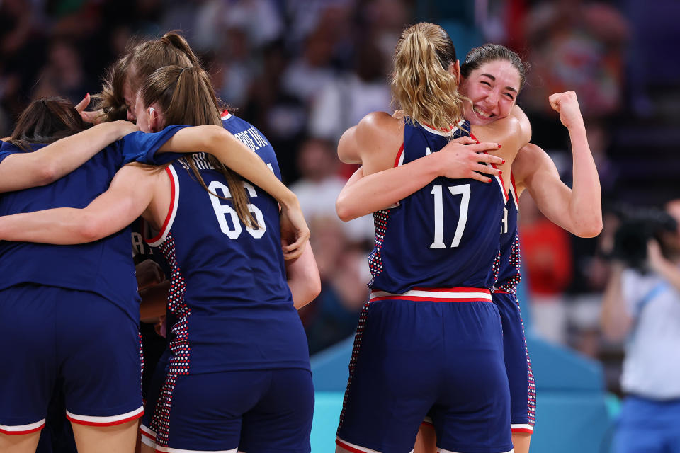 LILLE, FRANCE - JULY 31: Masa Jankovic #25 of Team Serbia and Jovana Nogic #17 of Team Serbia celebrate victory during the Women's Group Phase - Group A match between Team People’s Republic of China and Team Serbia on day five of the Olympic Games Paris 2024 at Stade Pierre Mauroy on July 31, 2024 in Lille, France. (Photo by Gregory Shamus/Getty Images)