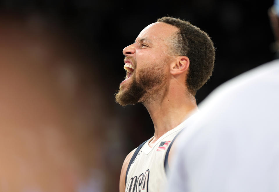 PARIS, FRANCE - AUGUST 08: Stephen Curry of United States celebrates after the Men's Basketball Semifinal Game between USA and Serbia on day thirteen of the Olympic Games Paris 2024 at Bercy Arena on August 08, 2024 in Paris, France. (Photo by Christina Pahnke - sampics/Getty Images)