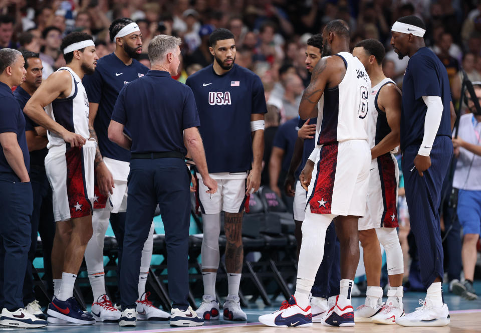 LILLE, FRANCE - JULY 31: Jayson Tatum #10 of Team United States, middle, looks on during a Men's Group Phase - Group C game between Puerto Rico and Serbia on day five of the Olympic Games Paris 2024 at Stade Pierre Mauroy on July 31, 2024 in Lille, France. (Photo by Gregory Shamus/Getty Images)