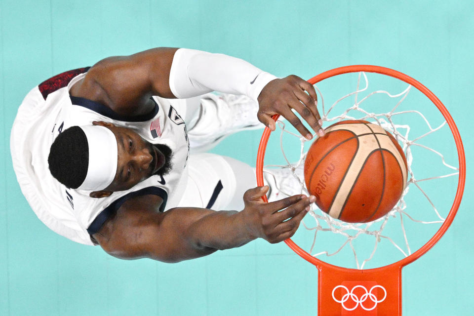 LILLE, FRANCE - JULY 31: (EDITORS NOTE: Image was captured using a remote camera positioned above the field of play) Bam Adebayo #13 of Team United States dunks the ball during a Men's Group Phase - Group C game between the United States and South Sudan on day five of the Olympic Games Paris 2024 at Stade Pierre Mauroy on July 31, 2024 in Lille, France. (Photo by Pool/2024 Getty Images)