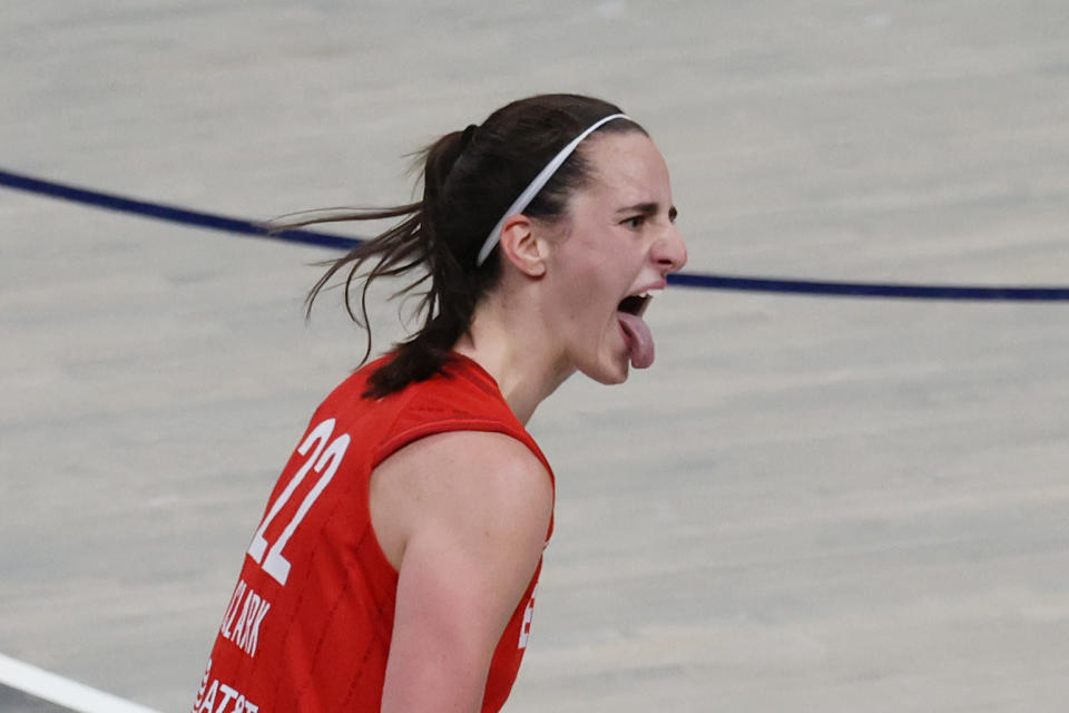 INDIANAPOLIS, IN - AUGUST 16: Indiana Fever guard Caitlin Clark (22) sticks out her tongue as she reacts to a play against the Phoenix Mercury at Gainbridge Fieldhouse on August 16, 2024 in Indianapolis, Indiana. (Photo by Brian Spurlock/Icon Sportswire via Getty Images)