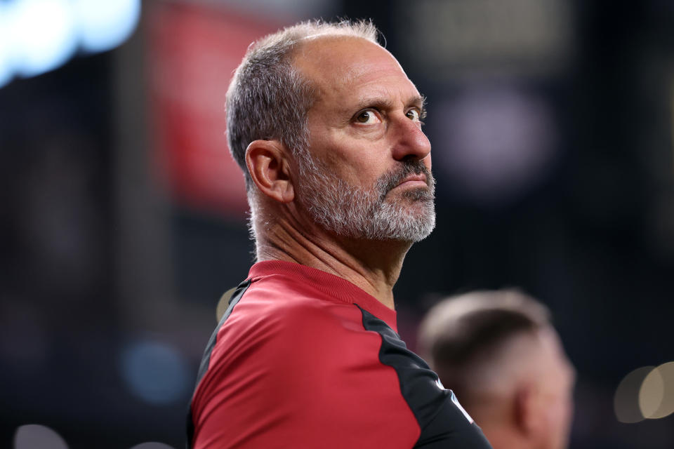 PHOENIX, ARIZONA - JULY 28: Manager Torey Lovullo #17 of the Arizona Diamondbacks looks on during the National Anthem before the game against the Arizona Diamondbacks at Chase Field on July 28, 2024 in Phoenix, Arizona. The Pirates defeated the Diamondbacks 6-5 in 10 innings. (Photo by Chris Coduto/Getty Images)