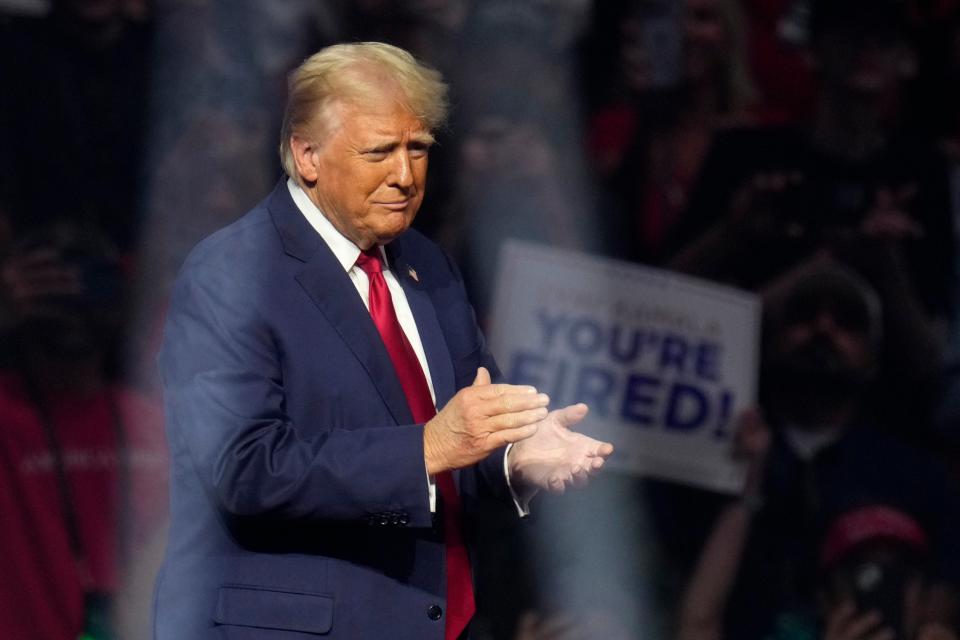 Republican presidential nominee former President Donald Trump walks on stage to speak at a campaign rally Friday, Aug. 23, 2024, in Glendale, Arizona (AP)