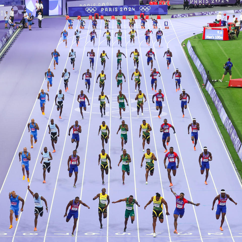 PARIS, FRANCE - AUGUST 04: (EDITORS NOTE: Image is a digital composite.) General view as Noah Lyles of Team United States competes the Men's 100m Final on day nine of the Olympic Games Paris 2024 at Stade de France on August 04, 2024 in Paris, France. Layers of the Games shows in one image the multiple moments that happen during a game or a day of competition during the Paris 2024 Olympic Games from a fixed camera. (Photo by Hector Vivas/Getty Images)