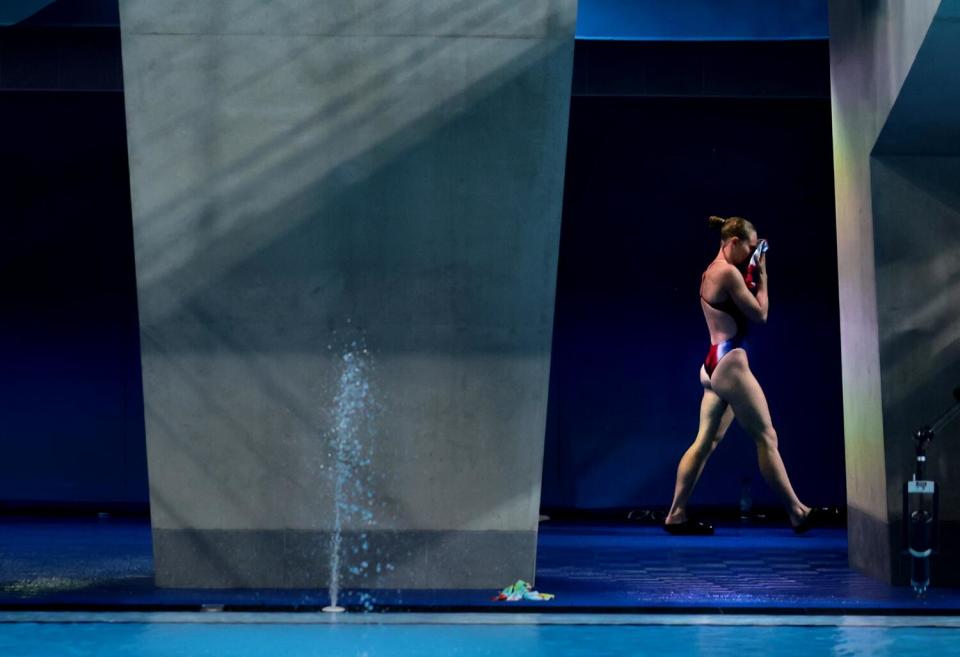 Divers warm-up in the women's 10 meter platform preliminaries at the 2024 Paris