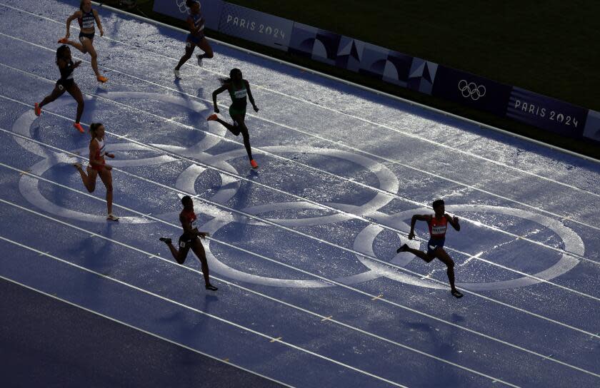 PARIS, FRANCE August 9, 2024-Women compete in the 400 meter final at the 2024 Paris Olympics Friday. (Skalij/Los Angeles Times)