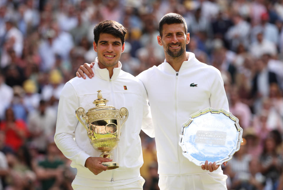 Alcaraz and Djokovic after last month's Wimbledon final. (Clive Brunskill/Getty Images)