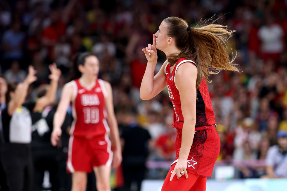 Sabrina Ionescu gestures towards the crowd. (Gregory Shamus/Getty Images)