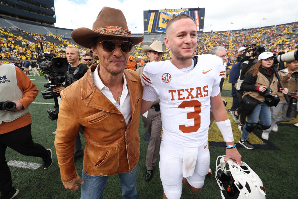 Matthew McConaughey celebrates with Texas QB Quinn Ewers after the win. (Gregory Shamus/Getty Images)