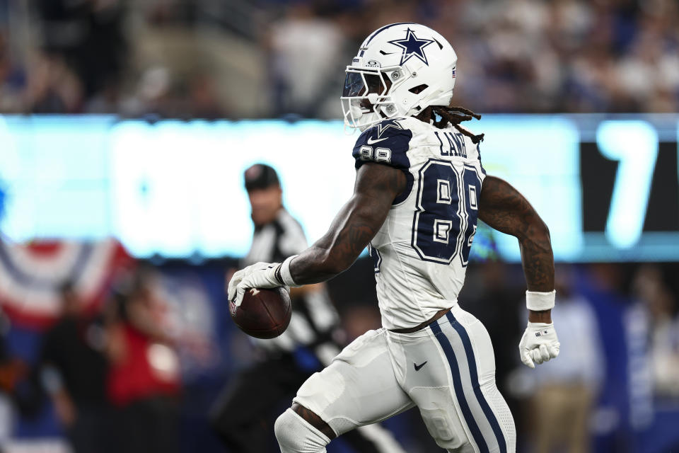 CeeDee Lamb of the Dallas Cowboys scores a touchdown against the New York Giants. (Photo by Kevin Sabitus/Getty Images)