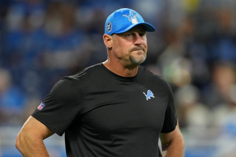 DETROIT, MICHIGAN - SEPTEMBER 08: Head coach Dan Campbell looks on during warmups prior to their game against the Los Angeles Rams at Ford Field on September 08, 2024 in Detroit, Michigan. (Photo by Nic Antaya/Getty Images)