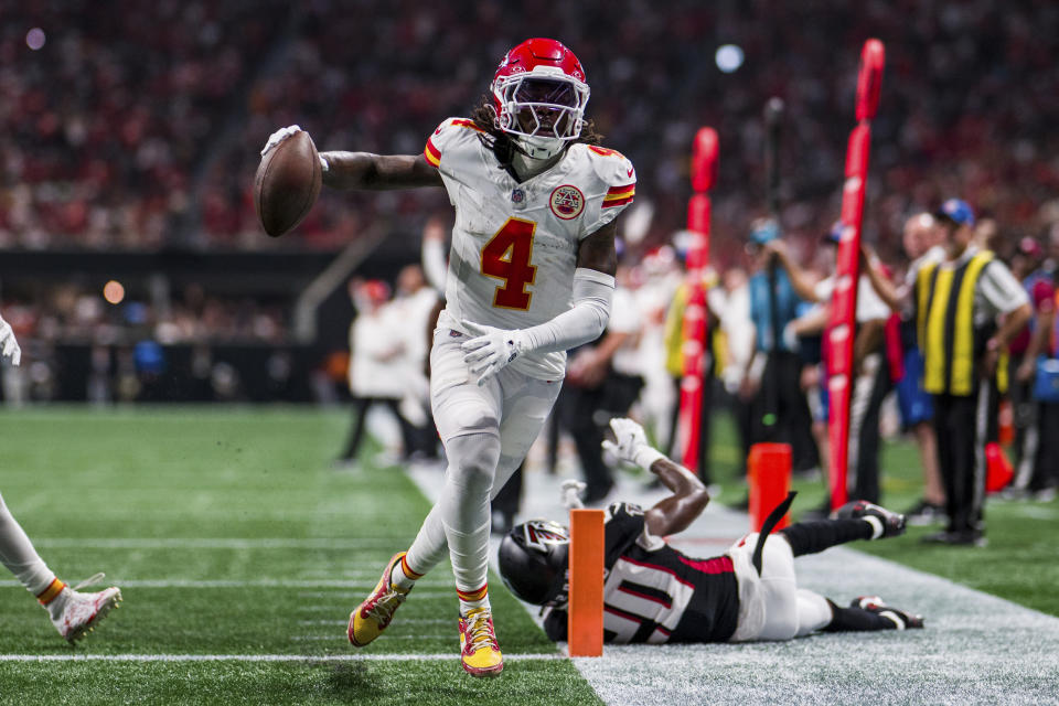 Kansas City Chiefs wide receiver Rashee Rice (4) runs into the end zone for a touchdown during the first half of an NFL football game against the Atlanta Falcons, Sunday, Sept. 22, 2024, in Atlanta. The Chiefs defeated the Falcons 22-17. (AP Photo/Danny Karnik)