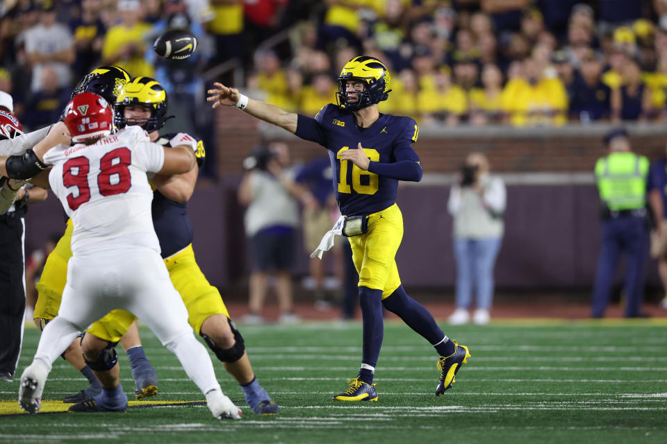 ANN ARBOR, MICHIGAN - AUGUST 31: Davis Warren #16 of the Michigan Wolverines throws a second half pass while playing the Fresno State Bulldogs at Michigan Stadium on August 31, 2024 in Ann Arbor, Michigan. (Photo by Gregory Shamus/Getty Images)