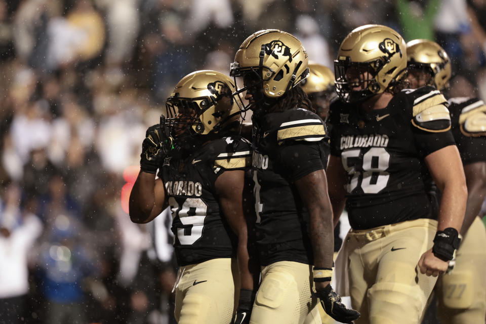 BOULDER, COLORADO - SEPTEMBER 21: Micah Welch #29 of the Colorado Buffaloes celebrates with teammates after scoring a touchdown during the fourth quarter against the Baylor Bears at Folsom Field on September 21, 2024 in Boulder, Colorado. (Photo by Andrew Wevers/Getty Images)