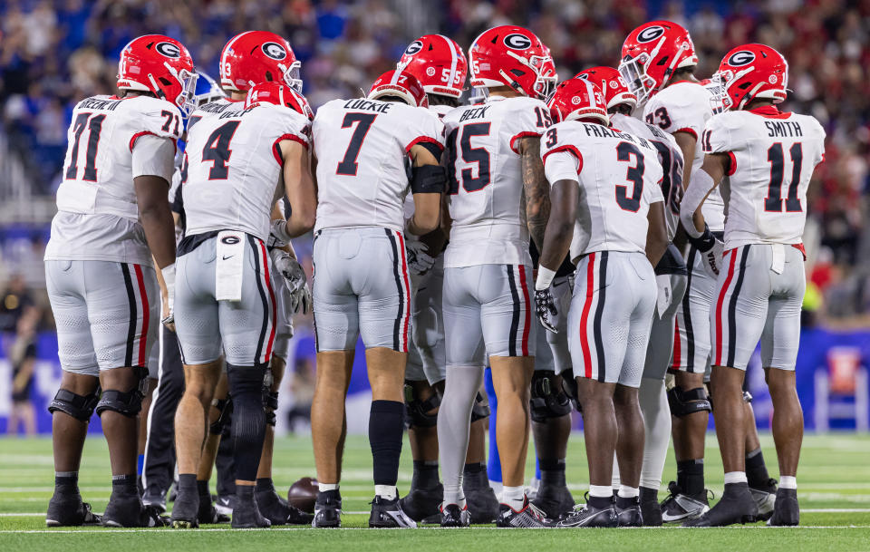 LEXINGTON, KENTUCKY - SEPTEMBER 14: Members of the Georgia Bulldogs huddle during the game against the Kentucky Wildcats at Kroger Field on September 14, 2024 in Lexington, Kentucky. (Photo by Michael Hickey/Getty Images)