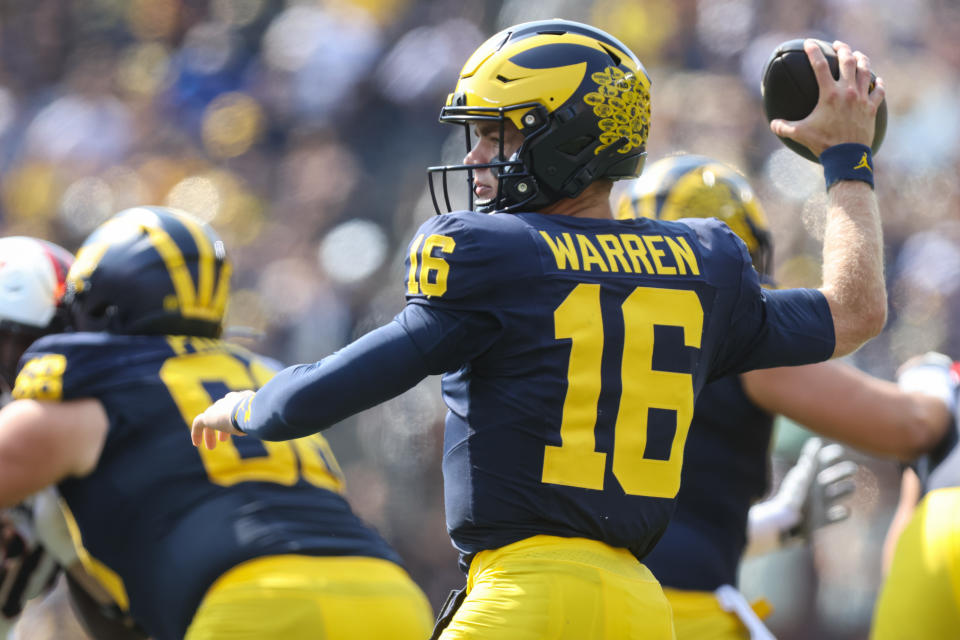 ANN ARBOR, MI - SEPTEMBER 14: Michigan Wolverines quarterback Davis Warren (16) throws a pass during the first quarter of a non-conference college football game between the Arkansas State Red Wolves and the Michigan Wolverines on September 14, 2024 at Michigan Stadium in Ann Arbor, Michigan. (Photo by Scott W. Grau/Icon Sportswire via Getty Images)