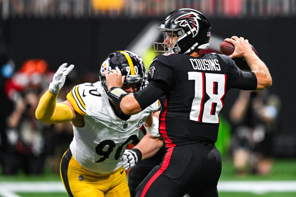 Kirk Cousins made his debut for the Atlanta Falcons against a fierce Steeler defense Sunday. (Rich von Biberstein/Icon Sportswire via Getty Images)