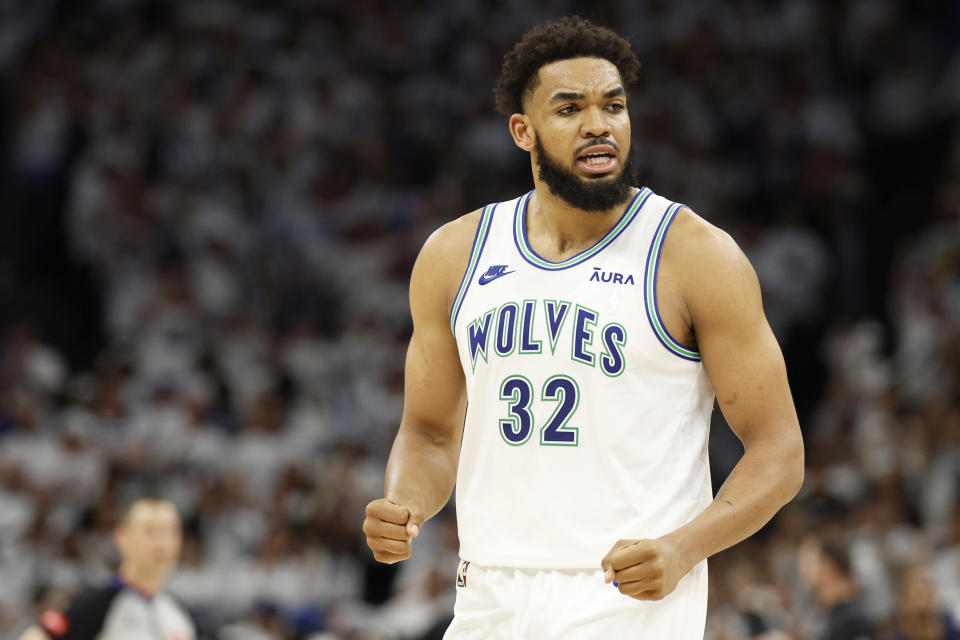 MINNEAPOLIS, MINNESOTA - MAY 22: Karl-Anthony Towns #32 of the Minnesota Timberwolves reacts during the fourth quarter against the Dallas Mavericks in Game One of the Western Conference Finals at Target Center on May 22, 2024 in Minneapolis, Minnesota. NOTE TO USER: User expressly acknowledges and agrees that, by downloading and or using this photograph, User is consenting to the terms and conditions of the Getty Images License Agreement. (Photo by David Berding/Getty Images)