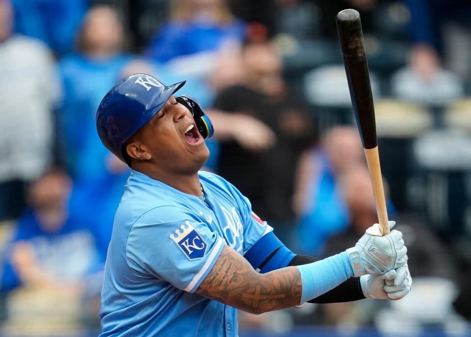 Royals catcher Salvador Perez reacts after hitting a pop fly against the Giants.