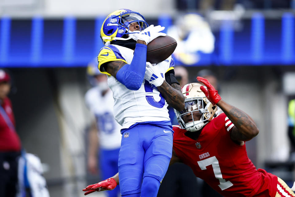 INGLEWOOD, CALIFORNIA - SEPTEMBER 22: Tutu Atwell #5 of the Los Angeles Rams catches a pass against Charvarius Ward #7 of the San Francisco 49ers during the fourth quarter at SoFi Stadium on September 22, 2024 in Inglewood, California. (Photo by Ronald Martinez/Getty Images)