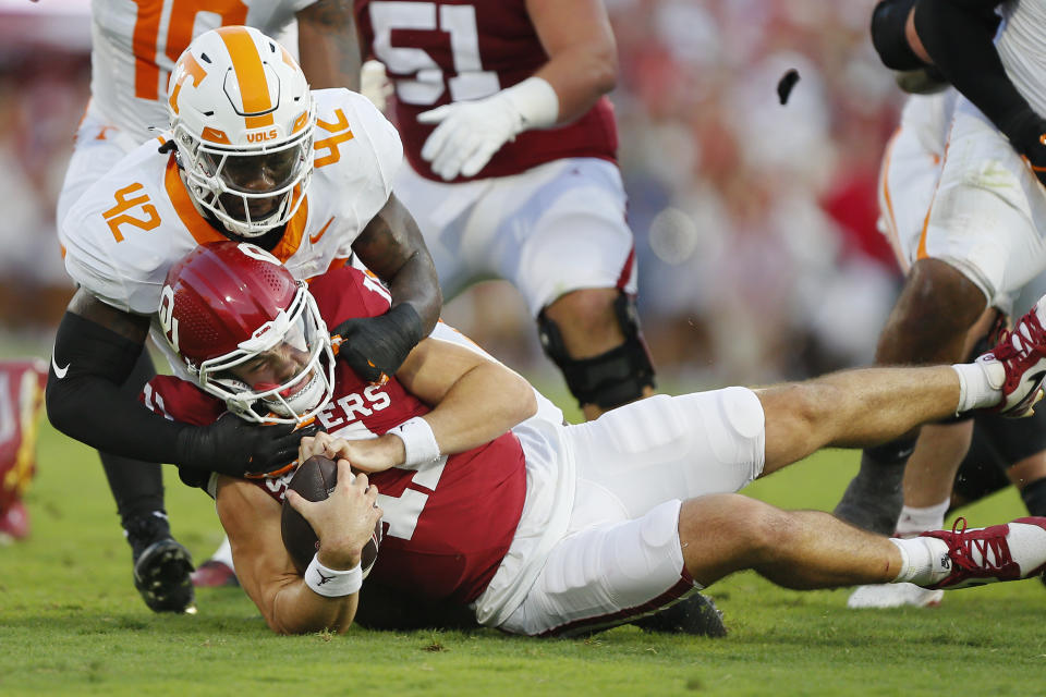 NORMAN, OKLAHOMA - SEPTEMBER 21: Defensive lineman Tyre West #42 of the Tennessee Volunteers sacks quarterback Jackson Arnold #11 of the Oklahoma Sooners for a loss in the first quarter at Gaylord Family Oklahoma Memorial Stadium on September 21, 2024 in Norman, Oklahoma. (Photo by Brian Bahr/Getty Images)