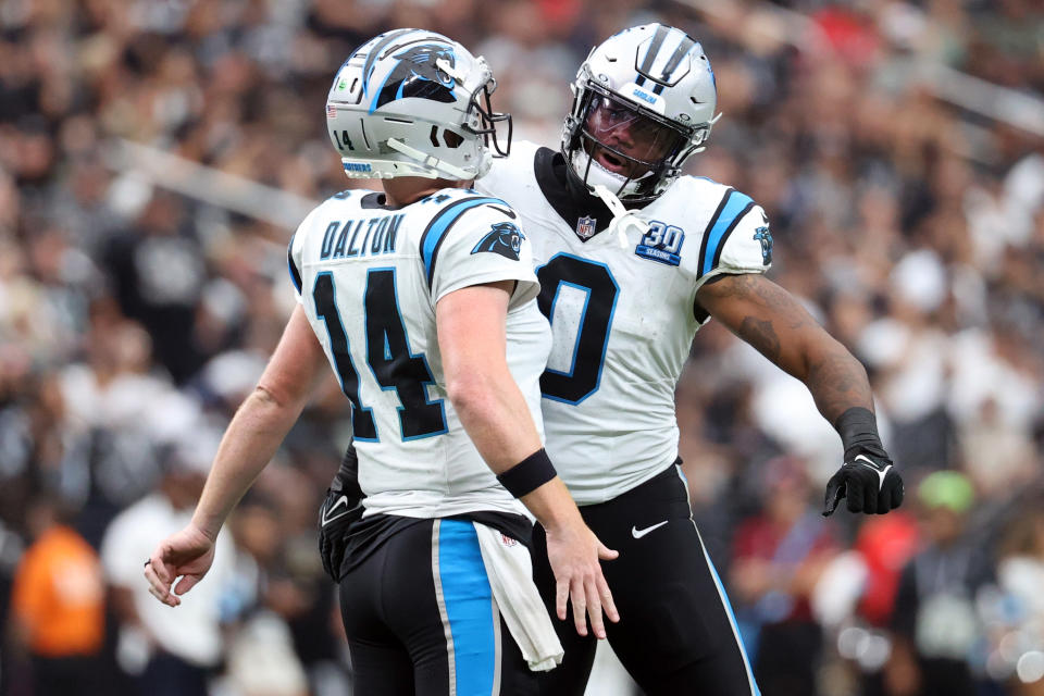 LAS VEGAS, NEVADA - SEPTEMBER 22: Andy Dalton #14 and Ja'Tavion Sanders #0 of the Carolina Panthers celebrate during the second quarter against the Las Vegas Raiders at Allegiant Stadium on September 22, 2024 in Las Vegas, Nevada. (Photo by Ian Maule/Getty Images)