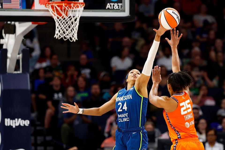 MINNEAPOLIS, MINNESOTA - JULY 04: Napheesa Collier #24 of the Minnesota Lynx blocks a shot by Alyssa Thomas #25 of the Connecticut Sun in the third quarter at Target Center on July 04, 2024 in Minneapolis, Minnesota. The Sun defeated the Lynx 78-73. (Photo by David Berding/Getty Images)