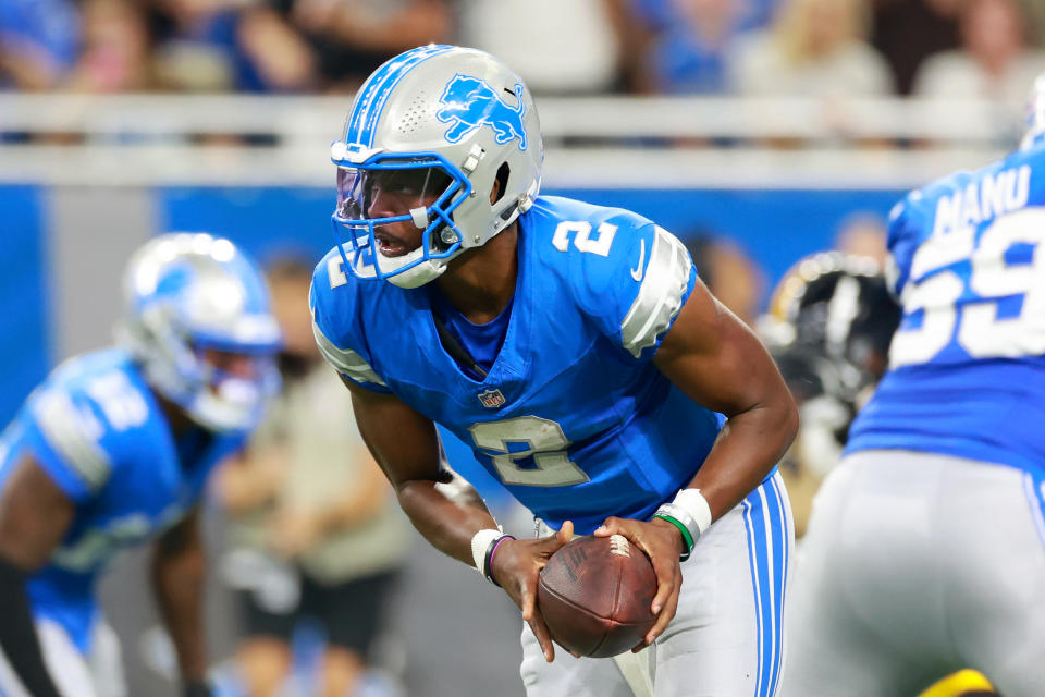 DETROIT,MICHIGAN-AUGUST 24: Detroit Lions quarterback Hendon Hooker (2) prepares to hand off the ball to Detroit Lions running back Jake Funk (36) during a preseason game between the Detroit Lions and the Pittsburgh Steelers in Detroit, Michigan USA, on Saturday, August 24, 2024 (Photo by Amy Lemus/NurPhoto via Getty Images)