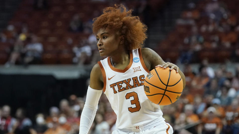 Guard Rori Harmon will return from an ACL tear to a Texas team that earned a No. 1 seed in last year's NCAA tournament without her and projects to start the season ranked in the top 10. (AP Photo/Eric Gay)