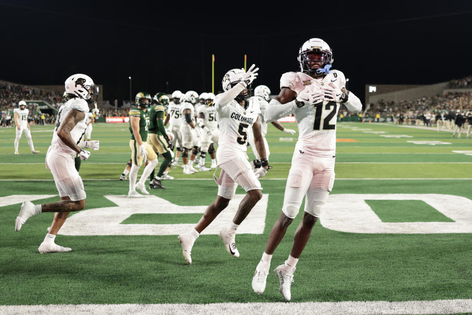 FORT COLLINS, COLORADO - SEPTEMBER 14: Travis Hunter #12 of the Colorado Buffaloes celebrates after scoring a touchdown during the third quarter against the Colorado State Rams at Canvas Stadium on September 14, 2024 in Fort Collins, Colorado. (Photo by Andrew Wevers/Getty Images)