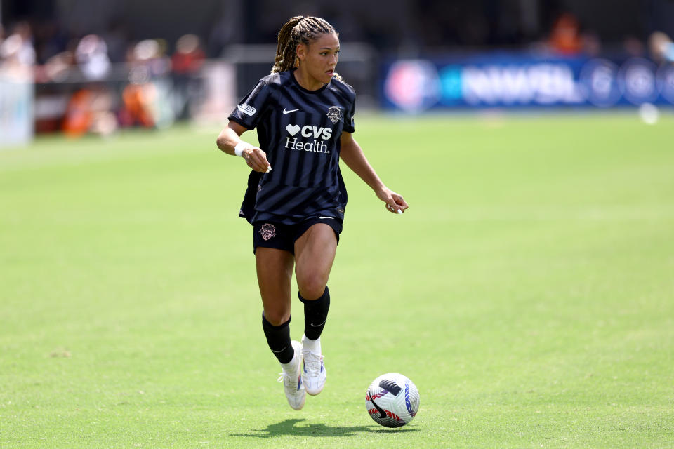 WASHINGTON, DC - AUGUST 25: Trinity Rodman #2 of Washington Spirit dribbles against Kansas City Current at Audi Field on August 25, 2024 in Washington, DC. (Photo by Tim Nwachukwu/Getty Images)