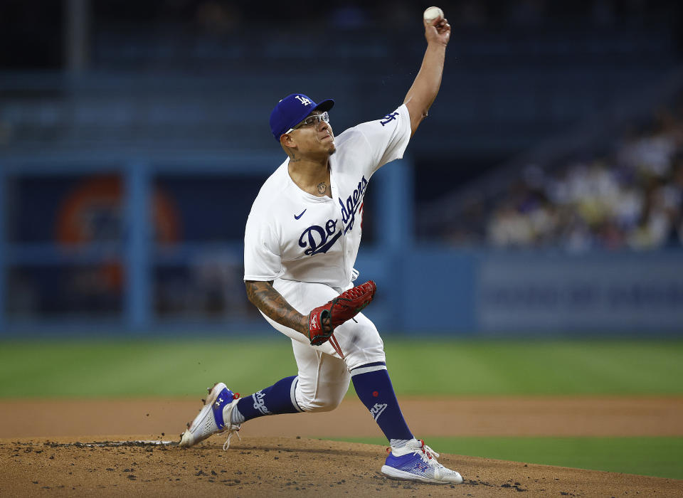 LOS ANGELES, CALIFORNIA - SEPTEMBER 01: Julio Urias #7 of the Los Angeles Dodgers throws against the Atlanta Braves in the first inning at Dodger Stadium on September 01, 2023 in Los Angeles, California. (Photo by Ronald Martinez/Getty Images)