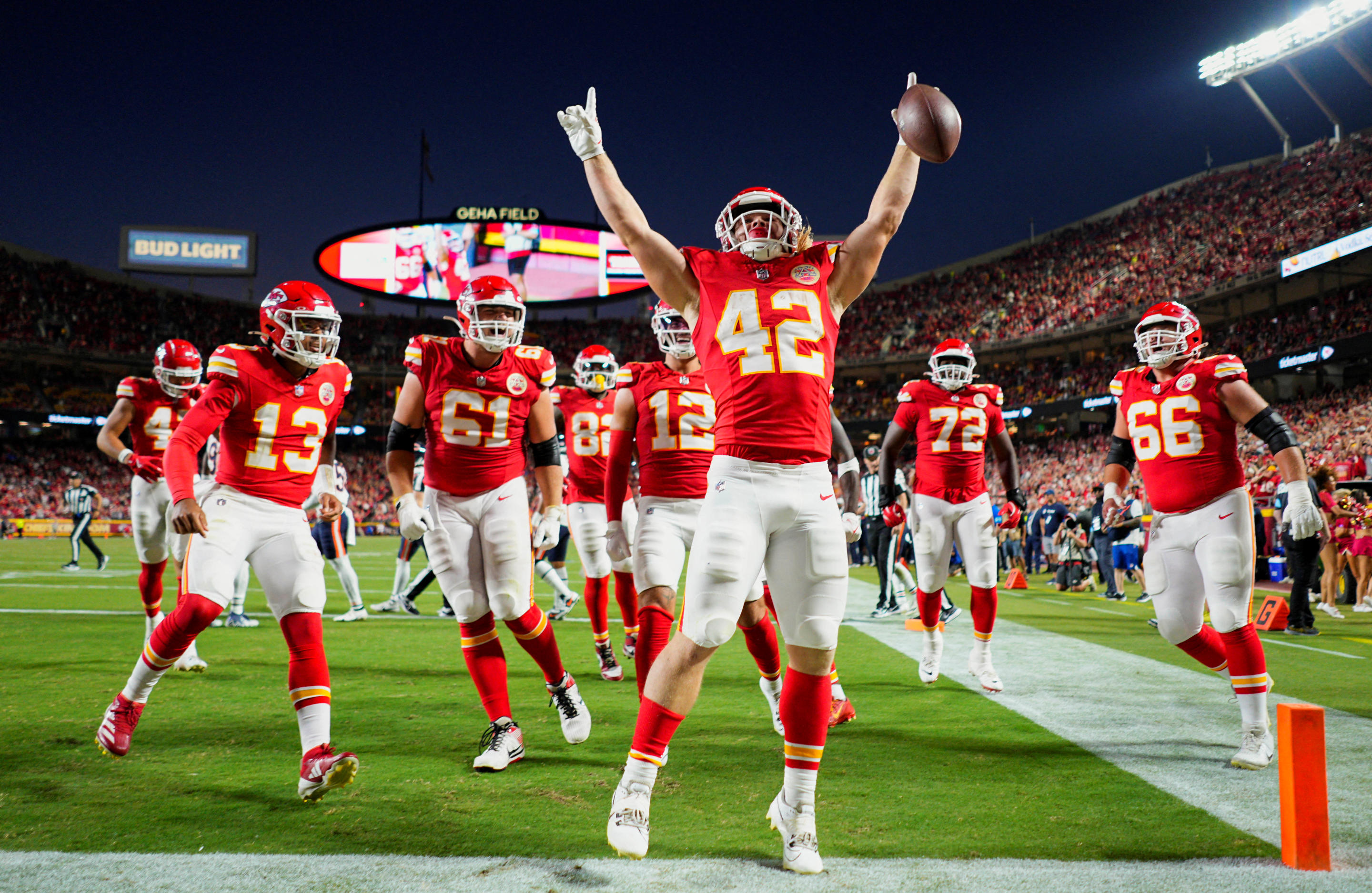 Aug 22, 2024; Kansas City, Missouri, USA; Kansas City Chiefs running back Carson Steele (42) celebrates with teammates after scoring a touchdown during the first half against the Chicago Bears at GEHA Field at Arrowhead Stadium. The touchdown would be called back. Mandatory Credit: Jay Biggerstaff-USA TODAY Sports TPX IMAGES OF THE DAY