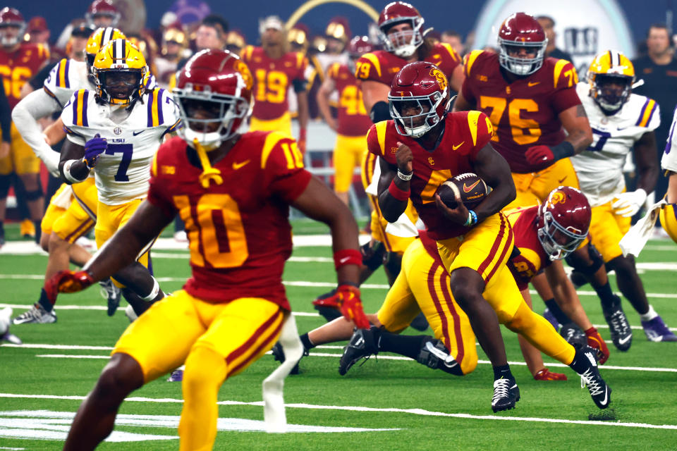 LAS VEGAS, NV - SEPTEMBER 01: Running back Woody Marks (4) of the USC Trojans runs upfield during the Modelo Vegas Kickoff Classic featuring the USC Trojans versus the LSU Tigers on September 1, 2024 at Allegiant Stadium in Las Vegas, Nevada. (Photo by Jeff Speer/Icon Sportswire via Getty Images)