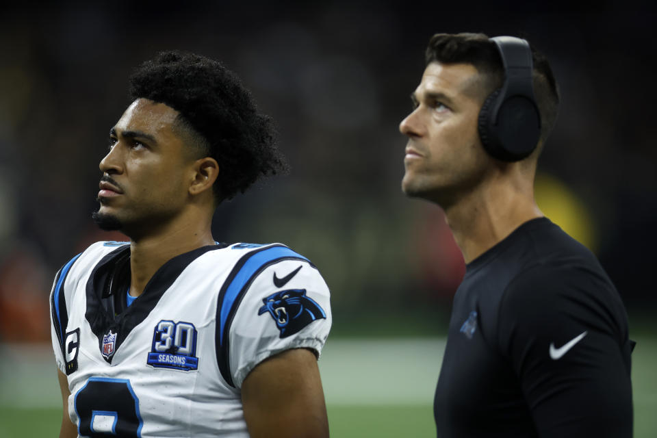 NEW ORLEANS, LOUISIANA - SEPTEMBER 08: Head coach of the Carolina Panthers Dave Canales talks with Bryce Young #9 of the Carolina Panthers against the New Orleans Saints at Caesars Superdome on September 08, 2024 in New Orleans, Louisiana. (Photo by Chris Graythen/Getty Images)