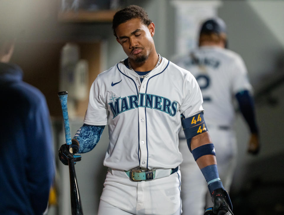 SEATTLE, WA - SEPTEMBER 18: Julio Rodriguez #44 of the Seattle Mariners reacts in the dugout after striking out during the fifth inning of a game against the New York Yankees at T-Mobile Park on September 18, 2024 in Seattle, Washington. (Photo by Stephen Brashear/Getty Images)