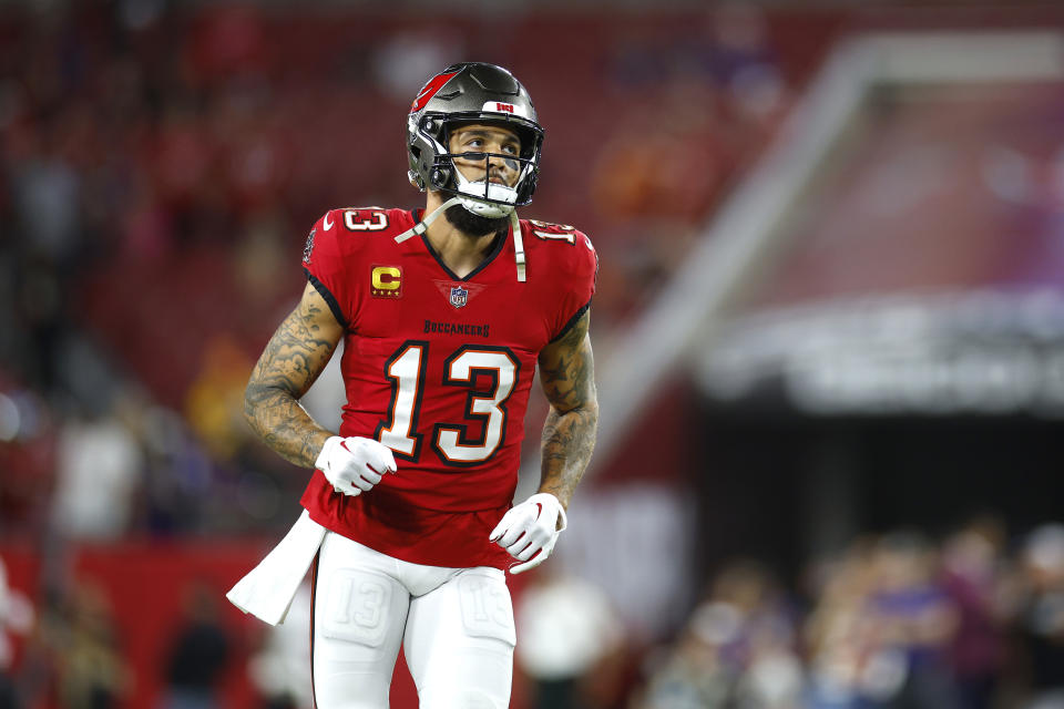 Mike Evans went down with a hamstring injury vs. the Ravens and was ruled out. (Mike Ehrmann/Getty Images)