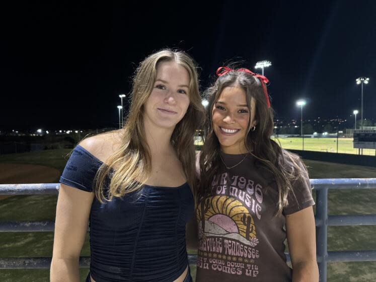 Swimmer Teagan O'Dell (left) and softball outfielder Jillian Torres of Santa Margarita will be signing grants in aid.