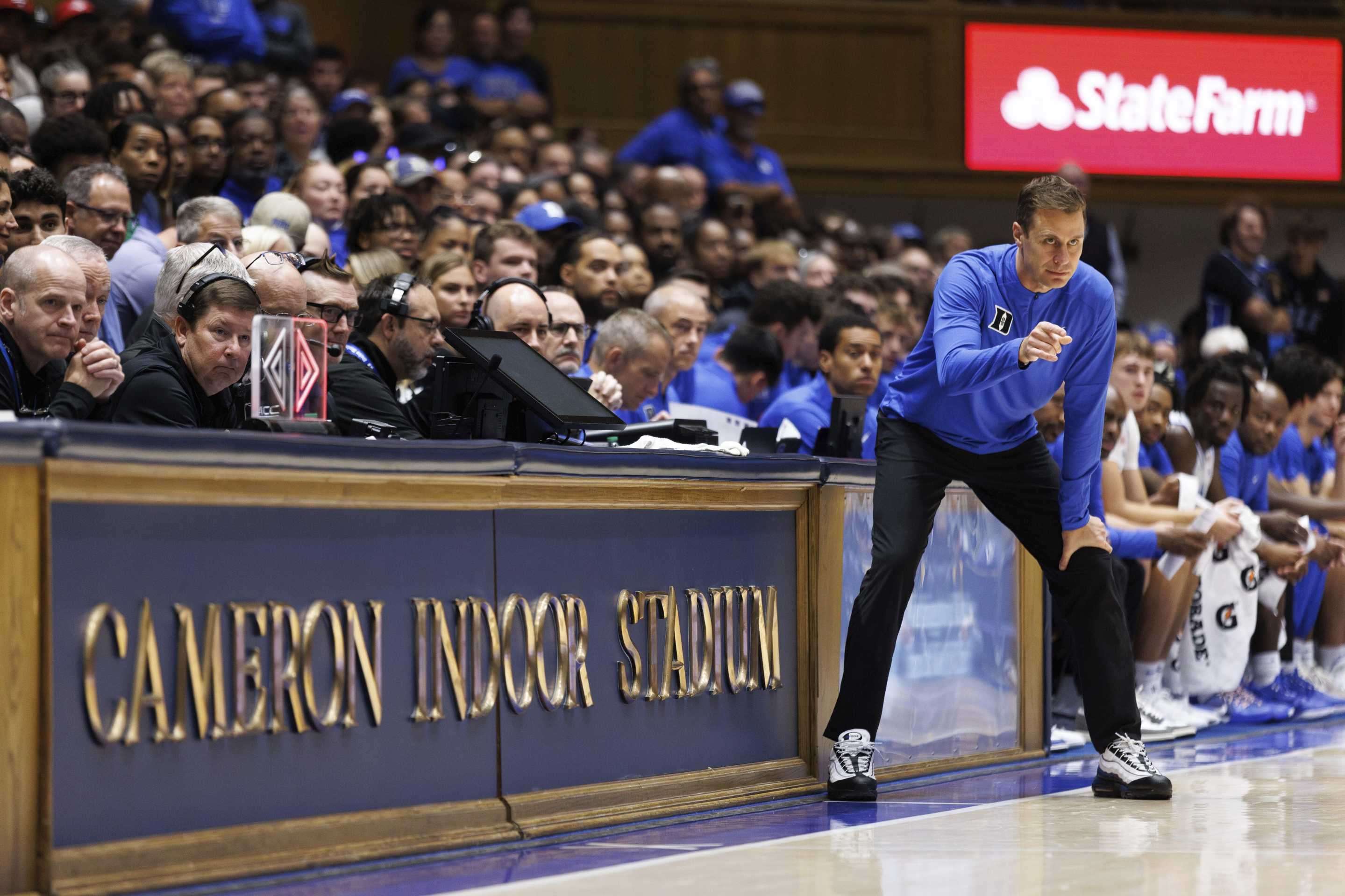 Duke head coach Jon Scheyer directs his team during the first half of NCAA college basketball exhibition game against Lincoln in Durham, N.C., Saturday, Oct. 19, 2024. (AP Photo/Ben McKeown)