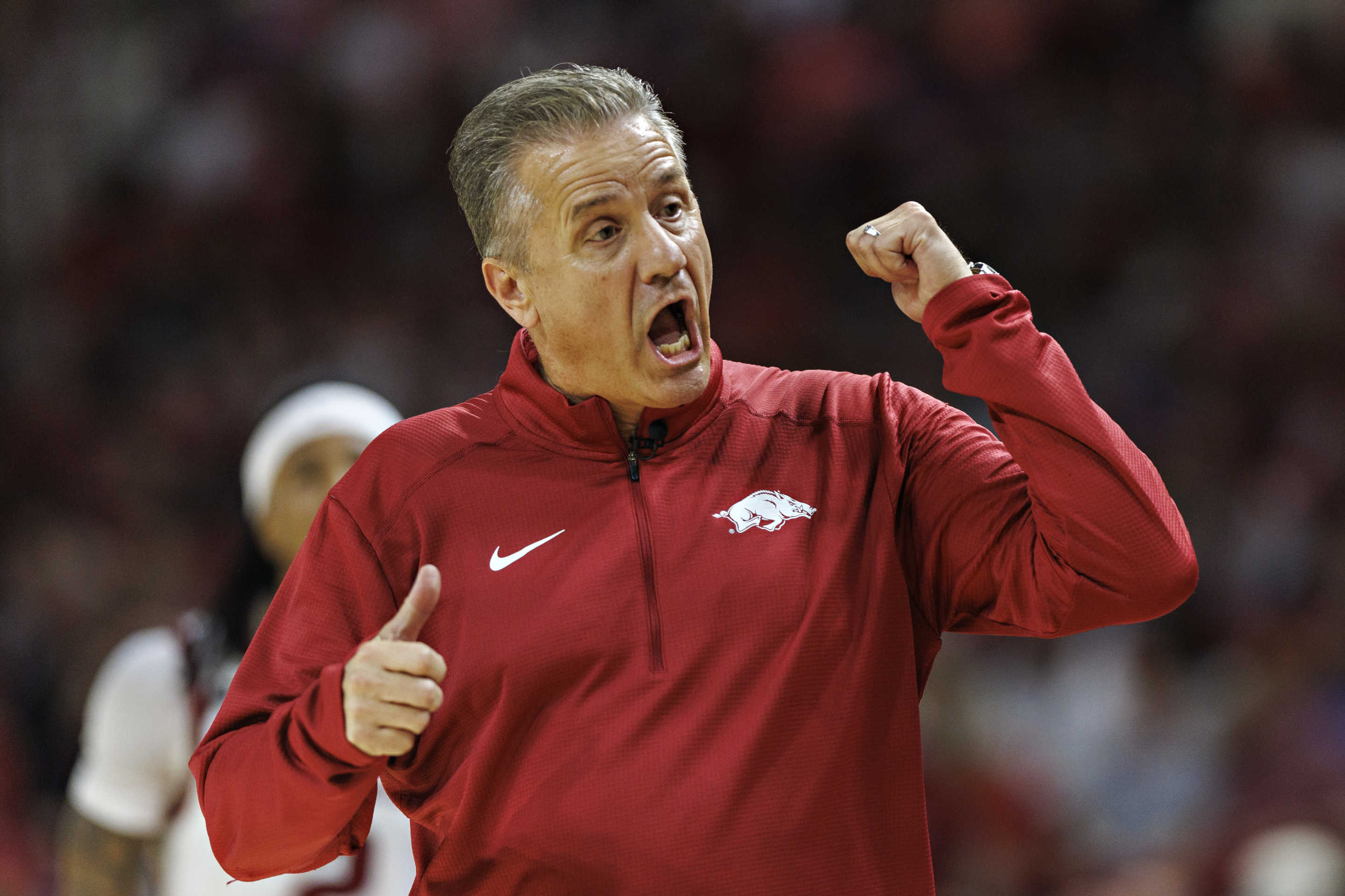 FAYETTEVILLE, ARKANSAS - OCTOBER 25: Head Coach John Calipari of the Arkansas Razorbacks directs his team during a game against the Kansas Jayhawks at Bud Walton Arena on October 25, 2024 in Fayetteville, Arkansas. The Razorbacks defeated the Jayhawks 85-69. (Photo by Wesley Hitt/Getty Images)